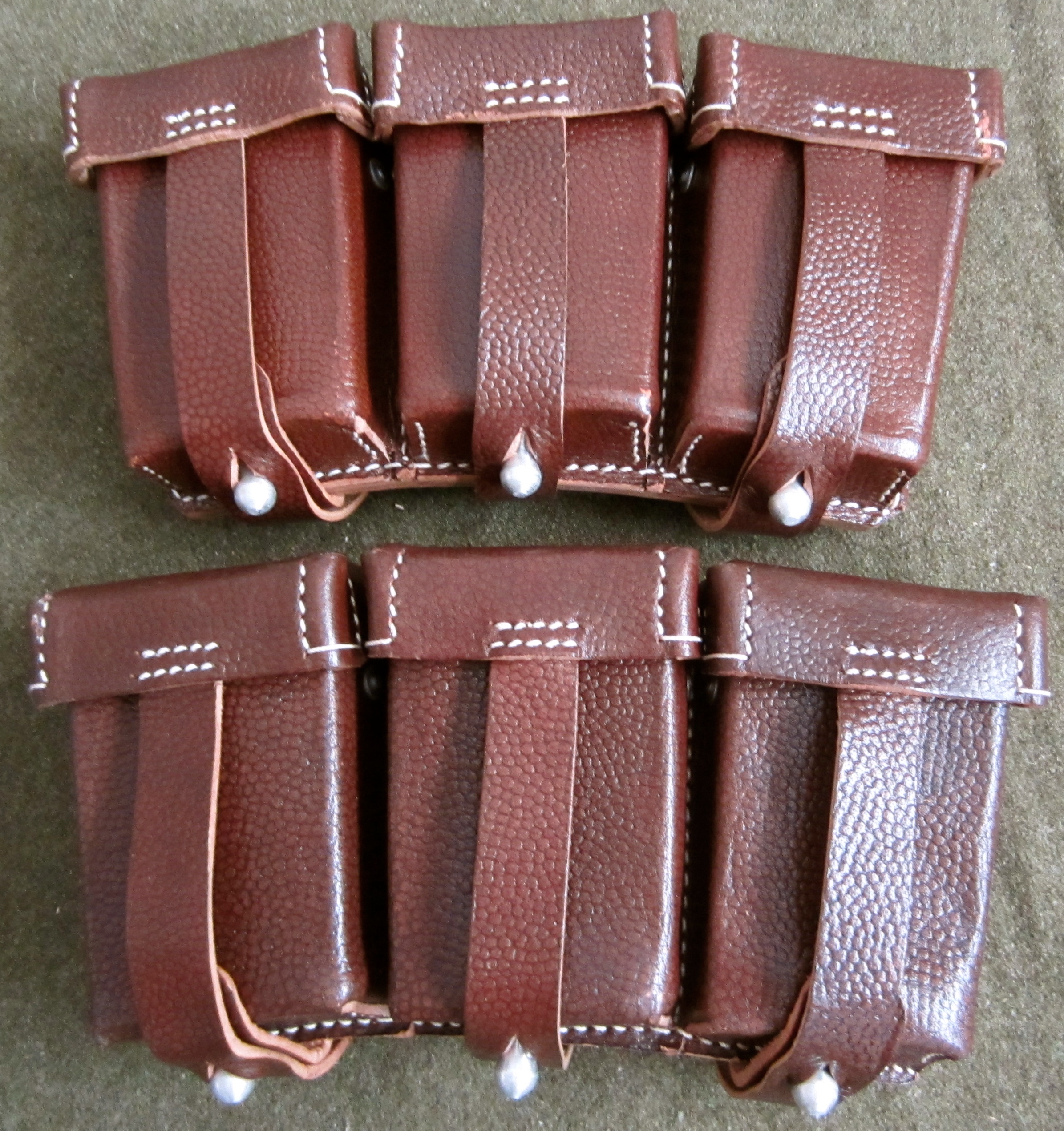 k98-rifle-ammo-pouches-brown-leather-man-the-line